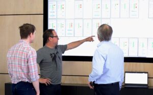 a picture of Kelvin Ross presenting on the slides for Datarwe