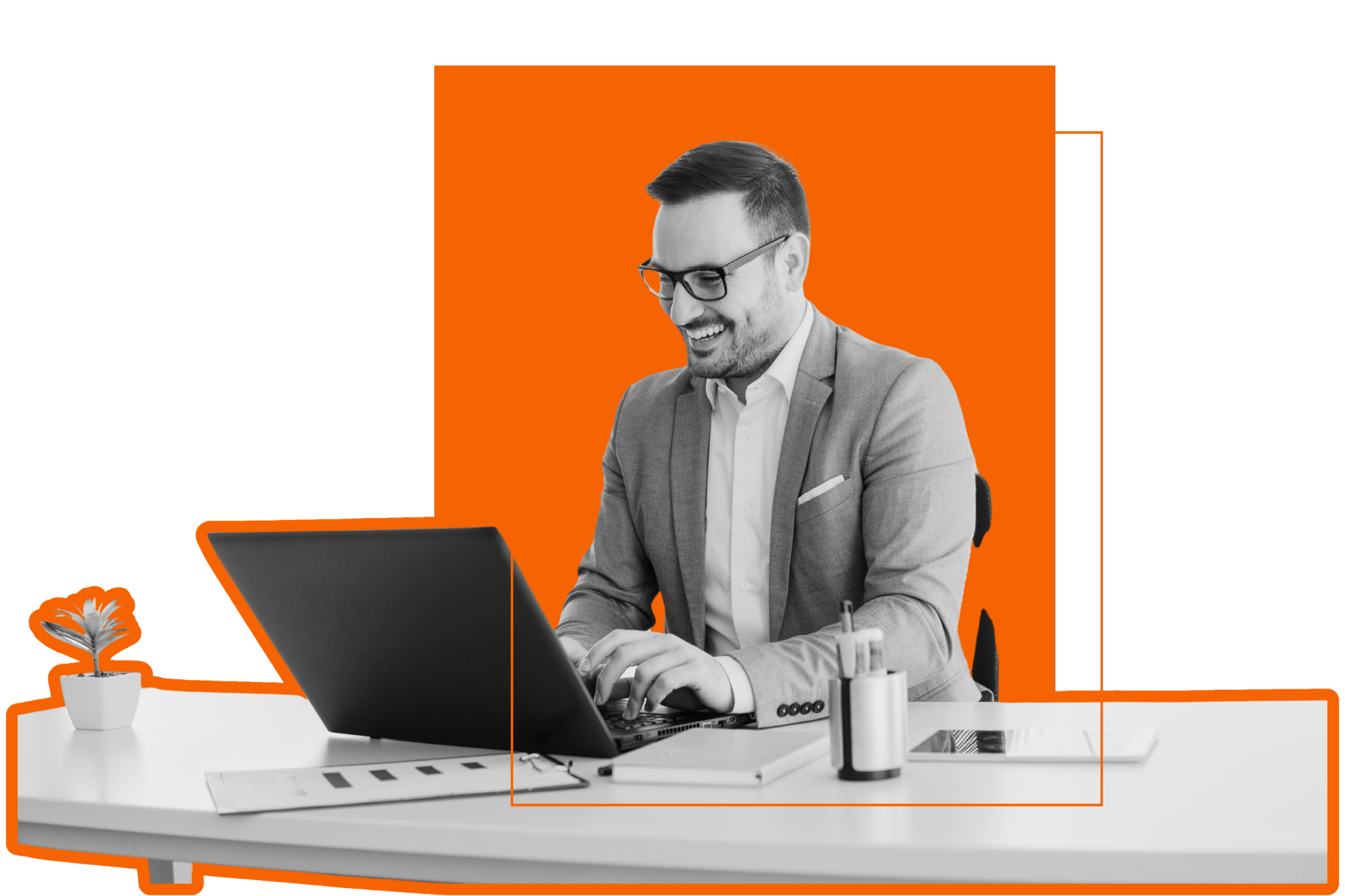 picture of a Member working behind the desk with laptop