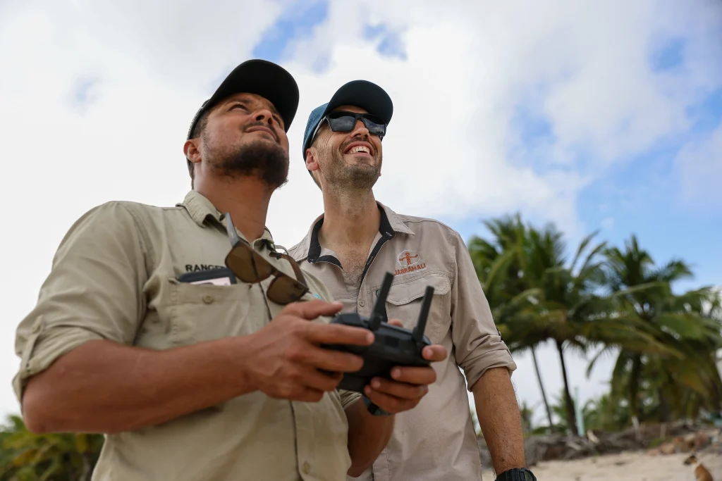 Aaron and his colleague working with drone
