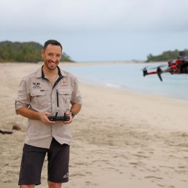 Picture of Aaron Bell controlling a Drone